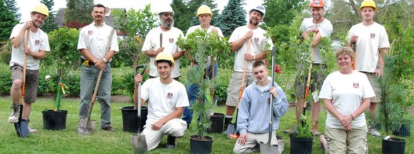 the ADCOR team planting treees