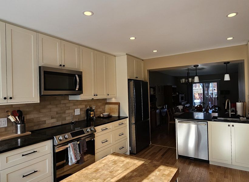 The result is a beautifully redesigned kitchen that not only looks stunning but also enhances the overall flow and functionality of the home. The seamless connection to the dining room creates an inviting space perfect for both everyday living and entertaining.