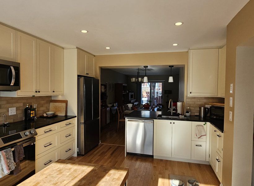 The result is a beautifully redesigned kitchen that not only looks stunning but also enhances the overall flow and functionality of the home. The seamless connection to the dining room creates an inviting space perfect for both everyday living and entertaining.
