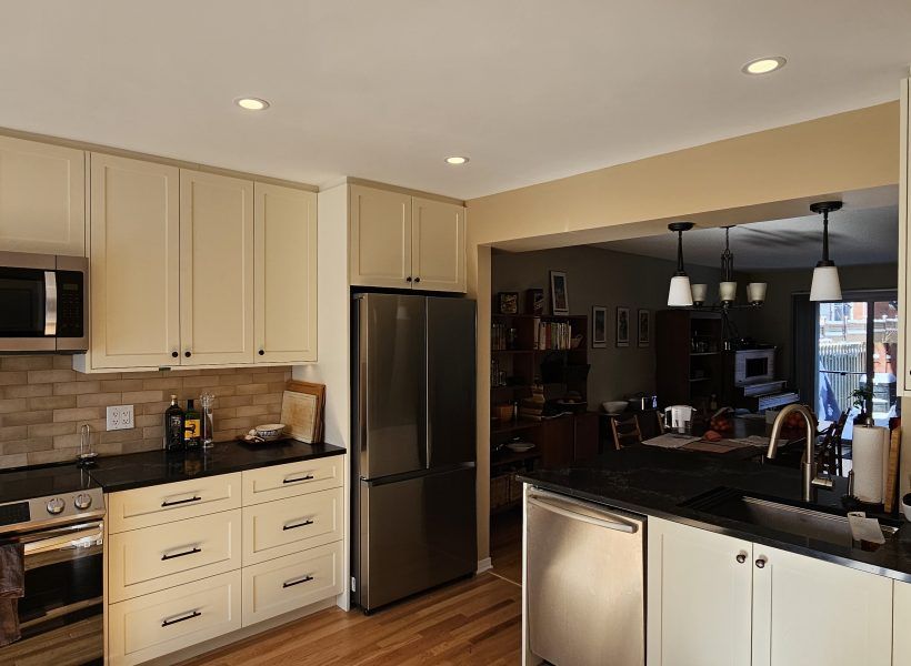 The result is a beautifully redesigned kitchen that not only looks stunning but also enhances the overall flow and functionality of the home. The seamless connection to the dining room creates an inviting space perfect for both everyday living and entertaining.