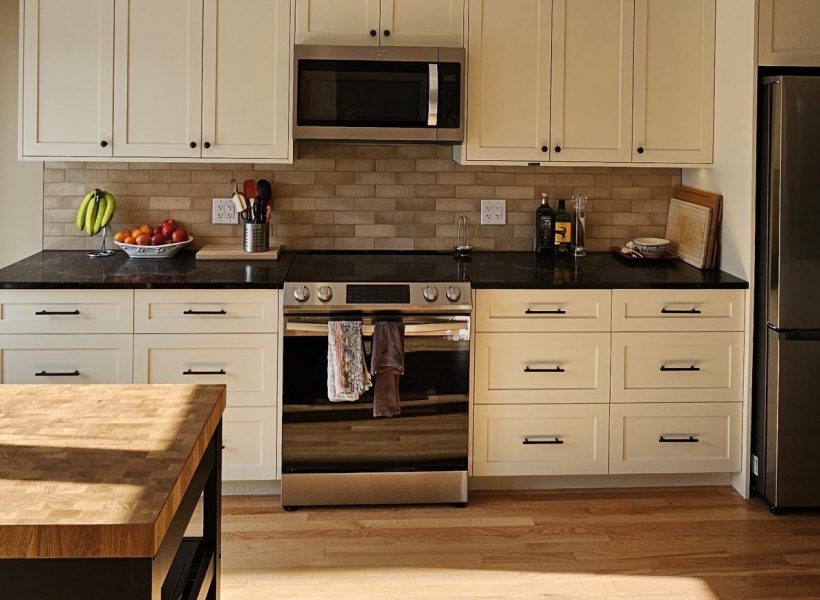 The result is a beautifully redesigned kitchen that not only looks stunning but also enhances the overall flow and functionality of the home. The seamless connection to the dining room creates an inviting space perfect for both everyday living and entertaining.