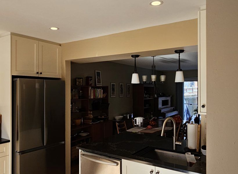 The result is a beautifully redesigned kitchen that not only looks stunning but also enhances the overall flow and functionality of the home. The seamless connection to the dining room creates an inviting space perfect for both everyday living and entertaining.