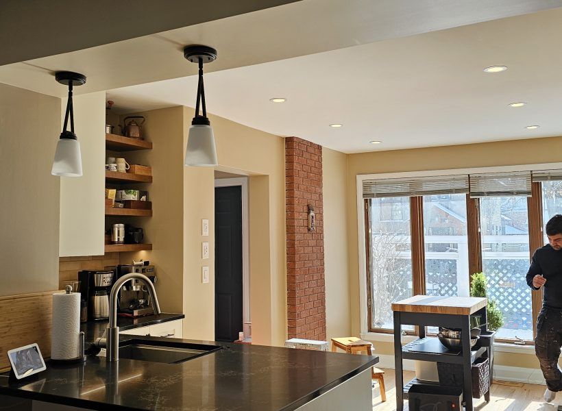 The result is a beautifully redesigned kitchen that not only looks stunning but also enhances the overall flow and functionality of the home. The seamless connection to the dining room creates an inviting space perfect for both everyday living and entertaining.