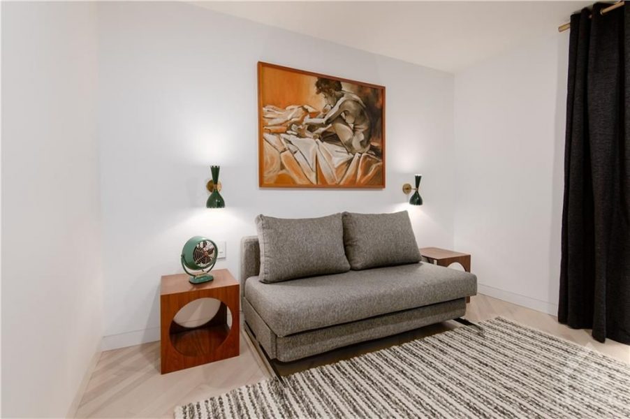 A re imagined upper level provided both a functional office area and a expansive and sleek bedroom, incorporating a built in wardrobe and an ensuite bath