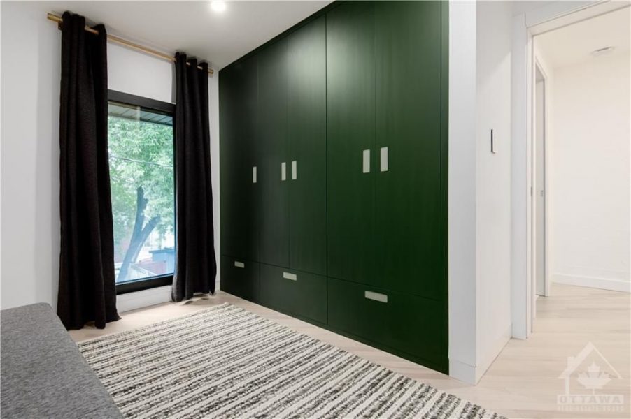A re imagined upper level provided both a functional office area and a expansive and sleek bedroom, incorporating a built in wardrobe and an ensuite bath