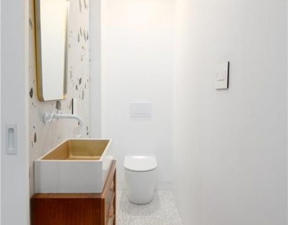 The renovation included the creation of two new washrooms, featuring contemporary fixtures and finishes, and a custom-designed kitchen that perfectly blends functionality with style.