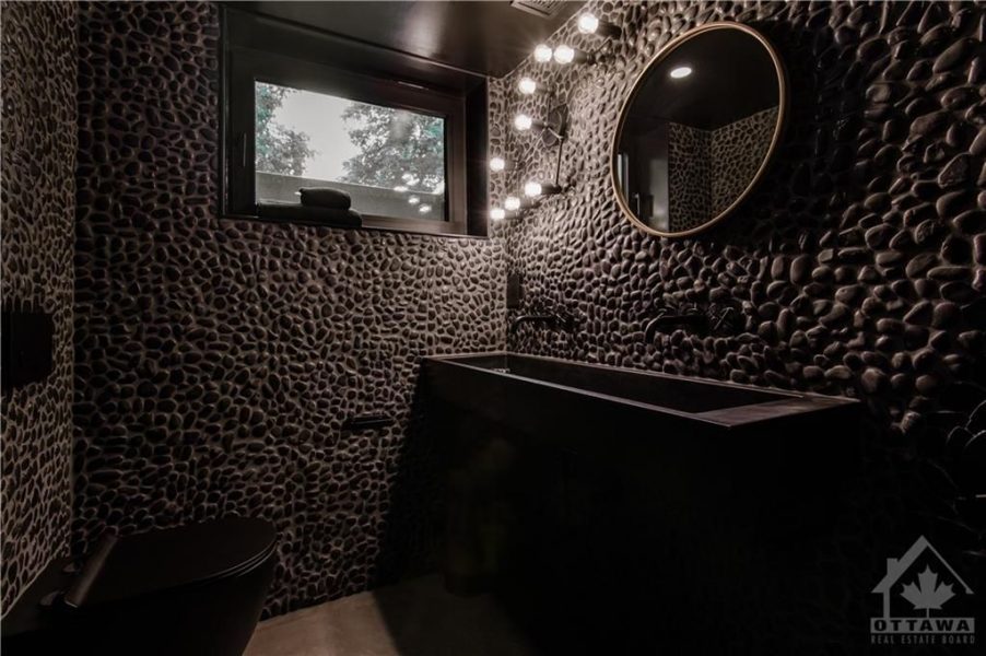 The renovation included the creation of two new washrooms, featuring contemporary fixtures and finishes, and a custom-designed kitchen that perfectly blends functionality with style.