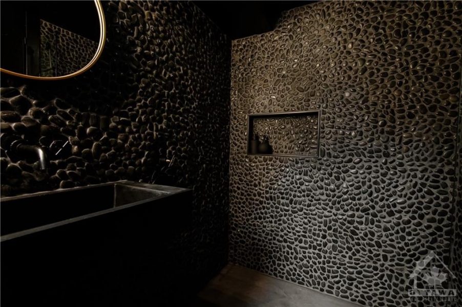 The renovation included the creation of two new washrooms, featuring contemporary fixtures and finishes, and a custom-designed kitchen that perfectly blends functionality with style.