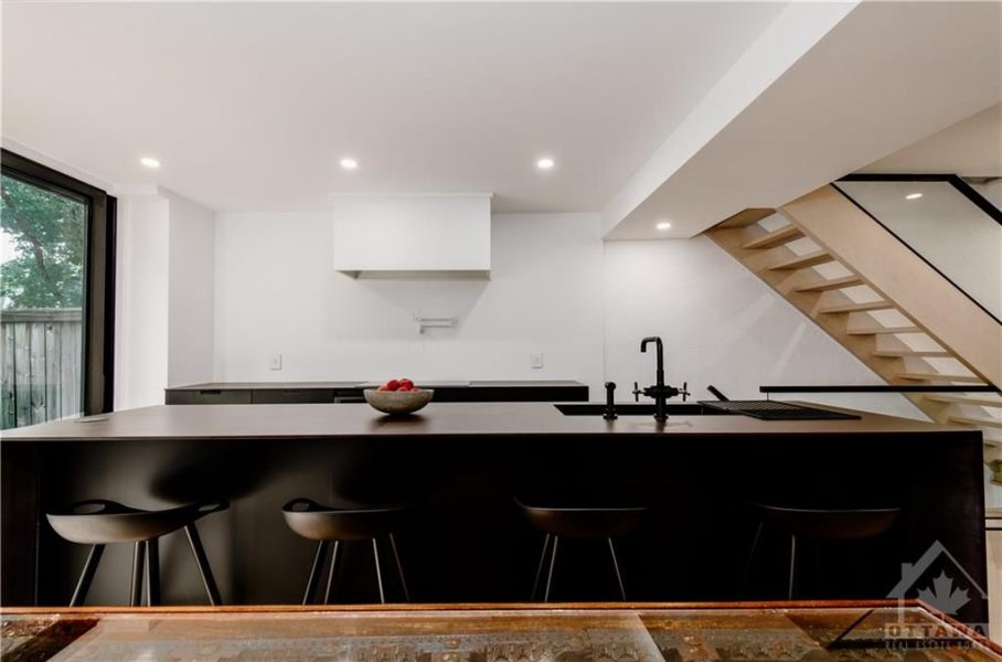 The house was essentially rebuilt and remodeled into a state-of-the-art home, seamlessly blending historic charm with modern luxury. The results are a testament to the collaborative efforts of a dedicated team and a visionary designer.