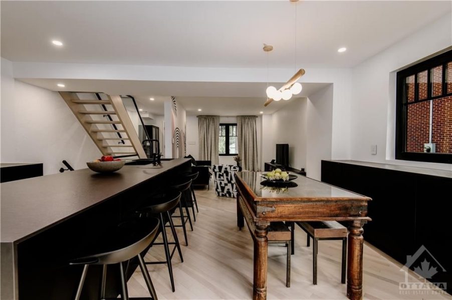 The house was essentially rebuilt and remodeled into a state-of-the-art home, seamlessly blending historic charm with modern luxury. The results are a testament to the collaborative efforts of a dedicated team and a visionary designer.